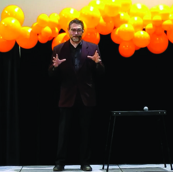 Markus Kublin speaks to the audience at the "Conjuring for a Cure" event at The Centre in Santa Clarita, Calif., Sunday, Oct. 11, 2026. Courtesy photo of David Rabotnick.
