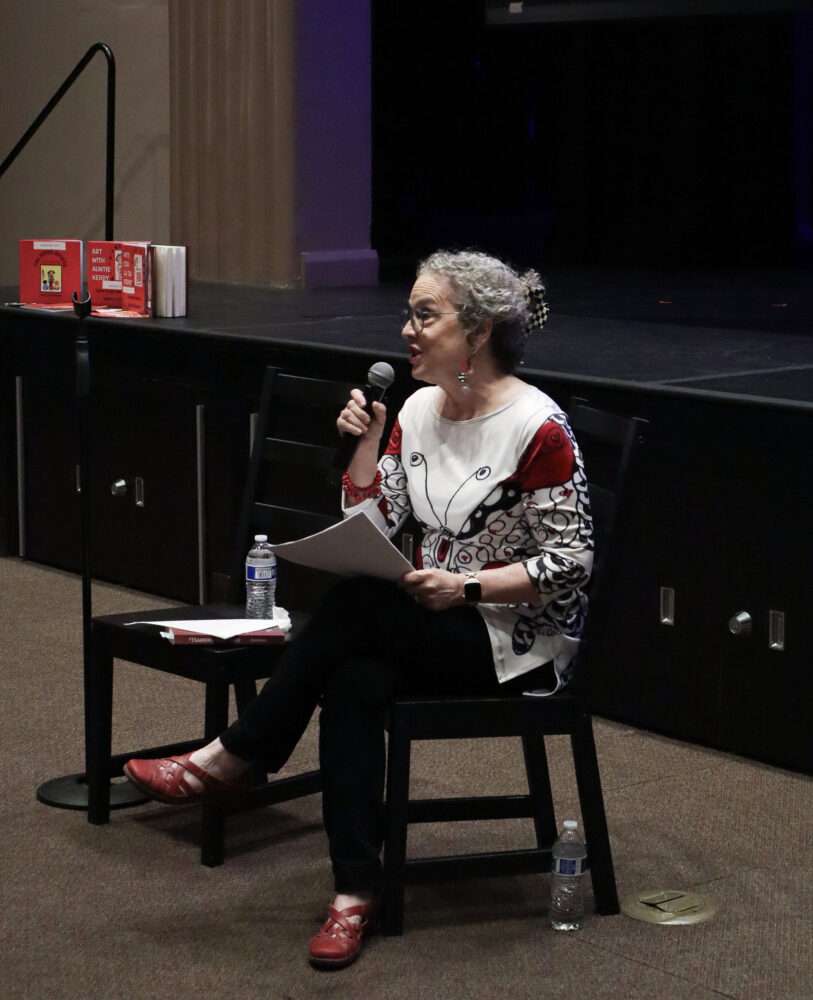 Kerry Dashnaw, author of "Yearning to be Free," speaks to attendees at her book talk at Newhall Family Theatre in Newall, Calif., Tuesday, Oct. 13. Kamryn Martell/The Signal