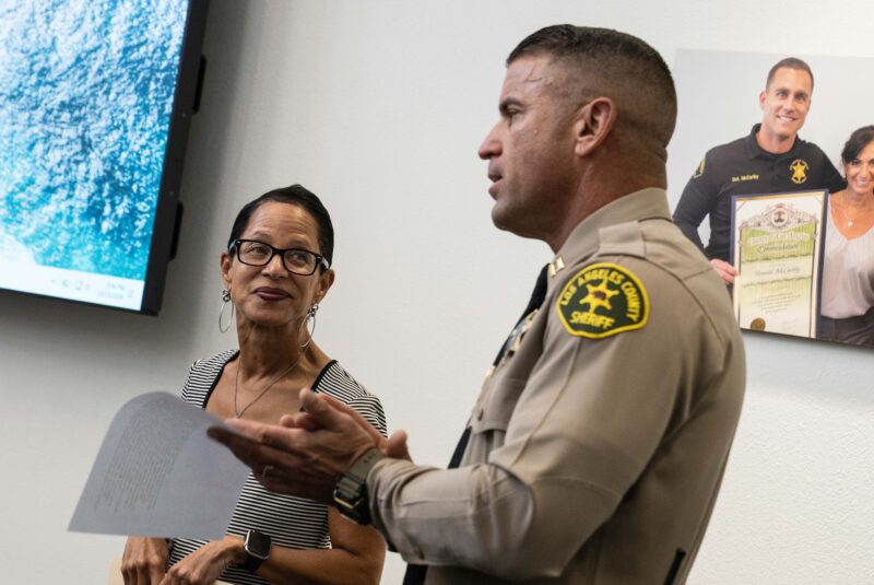 William S. Hart Union High School District assistant superintendent of student services Tara Brown (left) and Capt. Brandon Barclay of the SCV Sheriff’s Station speak on the importance of the student made public service announcements during the award ceremony on Wednesday, Oct. 14, 2026 at the SCV Sheriff’s Station. Katherine Quezada/The Signal