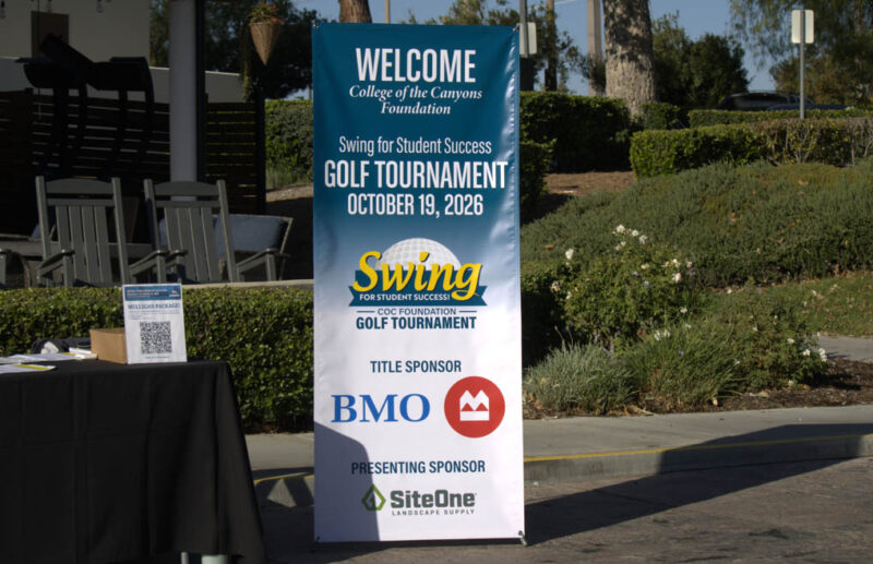 Banner welcoming attendees to the golf tournament at the Valencia Country Club in Valencia, Calif., Thursday, Oct, 19, 2026. Audrey De Laura/The Signal