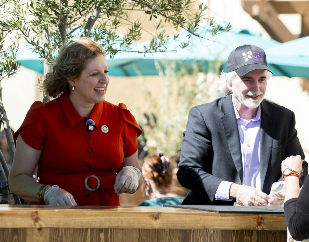 Assemblywoman Pilar Schiavo, D-Chatsworth, and Kevin MacDonald, CEO of the Senior Center, pass out ice cream to the attendees during the annual Senior Resource Fair at the Santa Clarita Valley Senior Center on Friday, Oct. 16, 2026. Habeba Mostafa/ The Signal