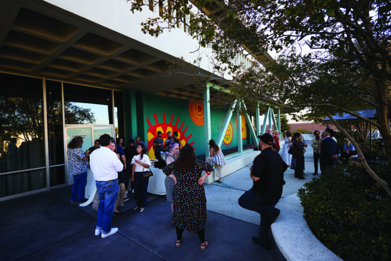 CalArts Mural Unveiling outside of Tatum Cafe  Generously supported by alumni Ryosaku Miyasaka (BFA Art 74), the project originated as a course led by River Garza, culminating in a winning design proposal selected by student vote. The resulting mural reframes our relationship with the environment through the lens of Indigenous cultural burnings, traditional ecological knowledge, and resilience. 
Photo courtesy of California Institute of the Arts