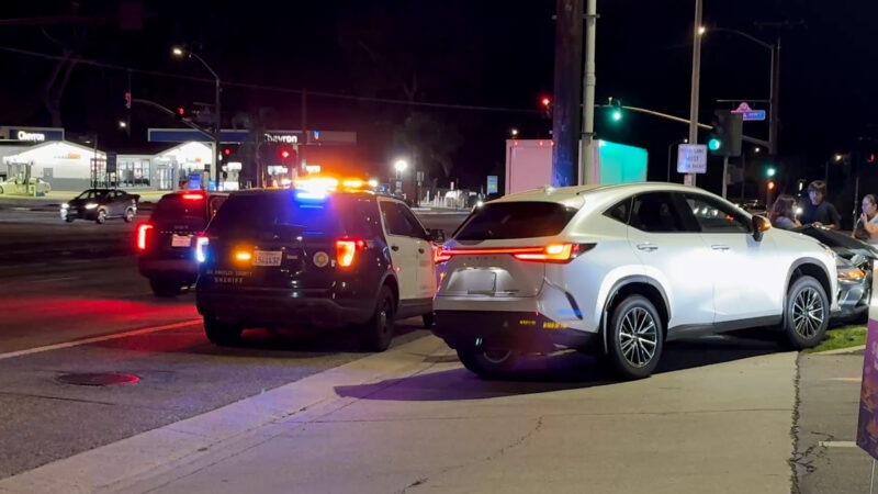 Police at the scene of the white Lexus SUV and the grey Camaro at Carl's Jr parking lot/sidewalk located on Newhall Ave and Sierra Highway, Calif., Tuesday, Oct, 20, 2026. Signal Staff/The Signal.
