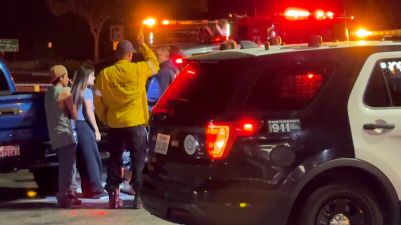 Police at the scene of the white Lexus SUV and the grey Camaro at Carl's Jr parking lot/sidewalk located on Newhall Ave and Sierra Highway, Calif., Tuesday, Oct, 20, 2026. Signal Staff/The Signal.
