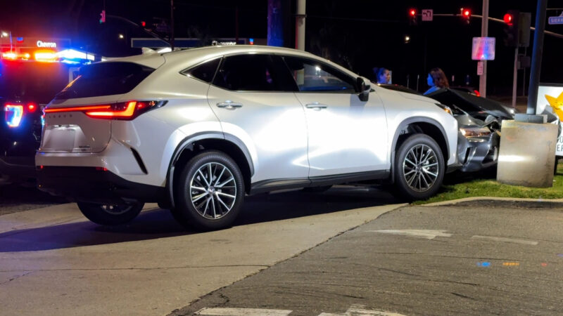 The collision of the white Lexus SUV and the grey Camaro at Carl's Jr parking lot/sidewalk located on Newhall Ave and Sierra Highway, Calif., Tuesday, Oct, 20, 2026. Signal Staff/The Signal.