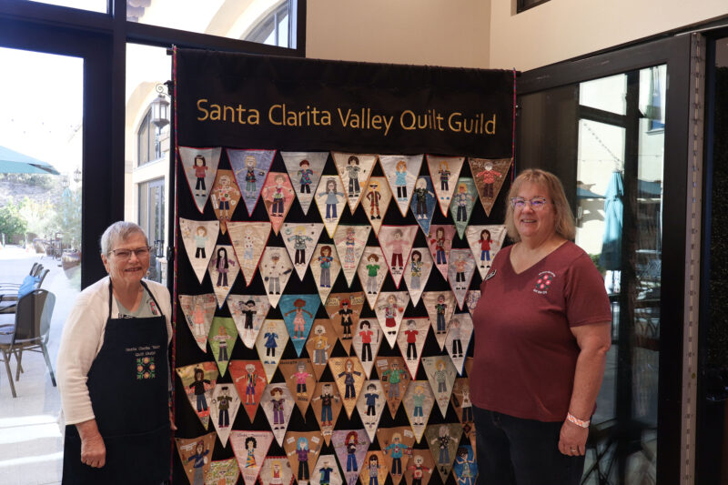 From left: Joann Lombardi and Darlene Stump smile for a photo at the Santa Clarita Valley Quilt Guild's quilt show at the SCV Senior Center at Bella Vida, Sunday, Oct. 25, 2026. Kamryn Martell/The Signal