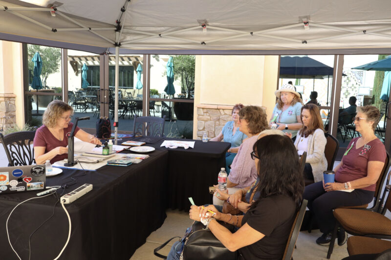 Jerri Stoyanoff (L, red shirt) does a demonstration at the Santa Clarita Valley Quilt Guild's quilt show at the SCV Senior Center at Bella Vida, Sunday, Oct. 25, 2026. Kamryn Martell/The Signal