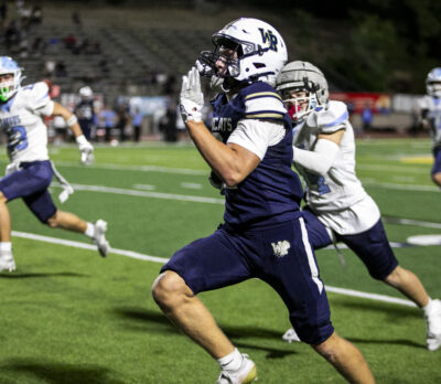 West Ranch wide receiver Charlie Samuelson (2) carries the ball, scoring West Ranch's first touchdown during Friday's game at College of the Canyons on Oct. 16, 2026. Habeba Mostafa/ The Signal