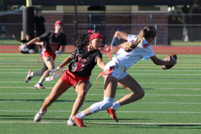 Hart’s Rylee Prieto (5) pulling the flag of the Chaminade quarterback during the second round of the CIF-SS Division 2 flag football playoffs on Oct. 24, 2026. Ryan Romero/The Signal