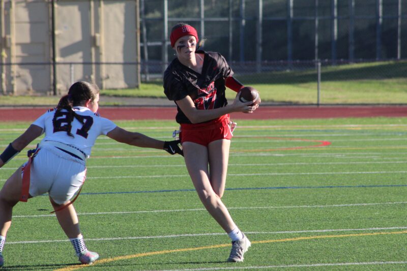 Hart’s Shelbie Ratzlaff (17) evading the Chaminade defender during the second round of the CIF-SS Division 2 flag football playoffs on Oct. 24, 2026. Ryan Romero/The Signal
