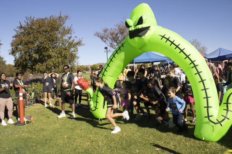 Racers start for the Kids and Puppy run at Finish the Ride and Finish the Run at West Creek Park in Valencia, Calif., Sunday, Oct 25, 2026. Audrey De Laura/The Signal