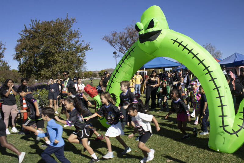 
Racers start for the Kids and Puppy run at Finish the Ride and Finish the Run at West Creek Park in Valencia, Calif., Sunday, Oct 25, 2026. Audrey De Laura/The Signal