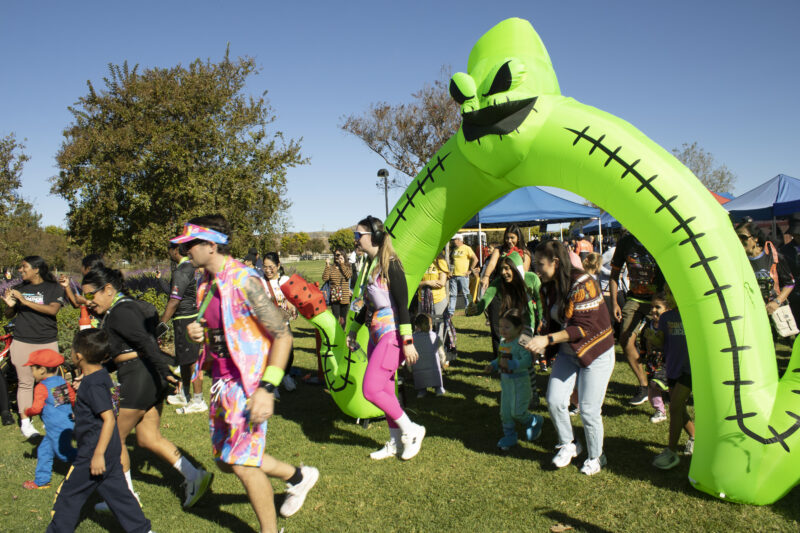 Racers start for the Kids and Puppy run at Finish the Ride and Finish the Run at West Creek Park in Valencia, Calif., Sunday, Oct 25, 2026. Audrey De Laura/The Signal