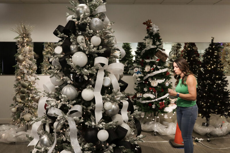 Nichole Garrett designs a Los Angeles Kings-themed tree at Valencia Town Center in Valencia, Calif., Monday, Oct. 26, 2026. Kamryn Martell/The Signal