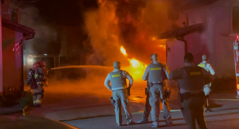 Two cars were engulfed in flames at a home on Avenida De Sonrisa in Saugus early Thursday morning. Photo courtesy of Dillon Foster.