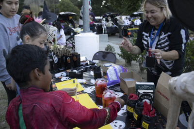 Attendees making potions at the Trick or Treat Village at Val Verde Park in Castaic, Calif., Wednesday, Oct, 28, 2026. Audrey De Laura/The Signal