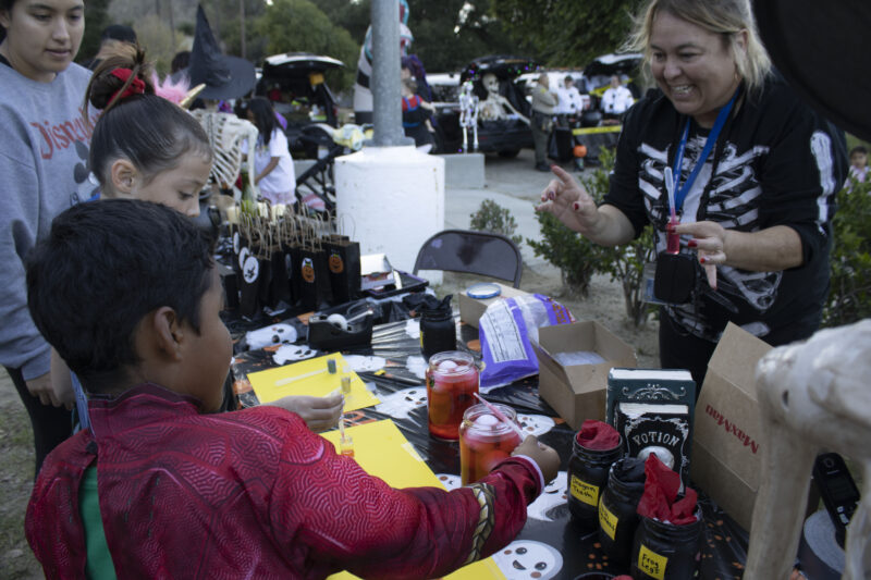 Attendees making potions at the Trick or Treat Village at Val Verde Park in Castaic, Calif., Wednesday, Oct, 28, 2026. Audrey De Laura/The Signal